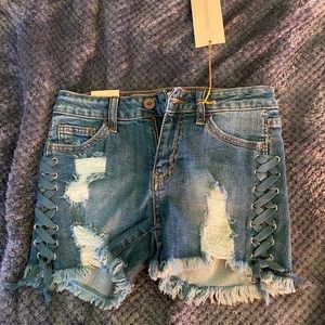 Jean shorts with woven sides